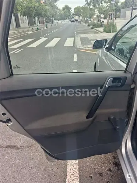 Usado VW Polo Highline 75 CV (55 kW) 2005 Gris / plata Utilitario