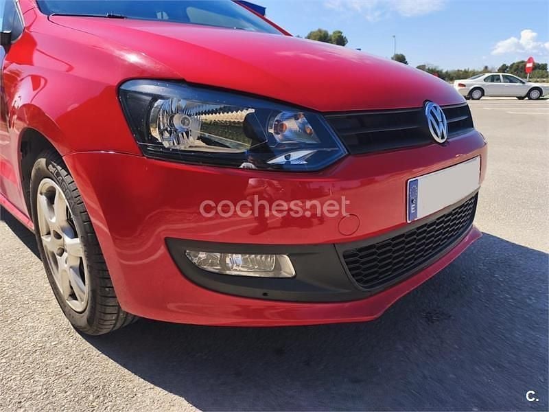 Używany VW Polo Advance 75 KM (55 kW) 2014 Czerwony Sedan/Limuzyna