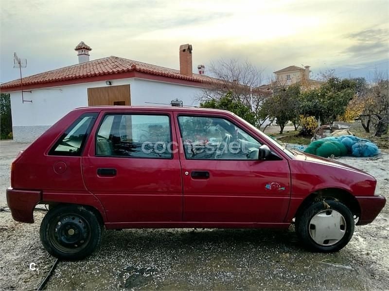 Usado Citroën AX Tonic 50 CV (36 kW) 1995 Rojo Utilitario