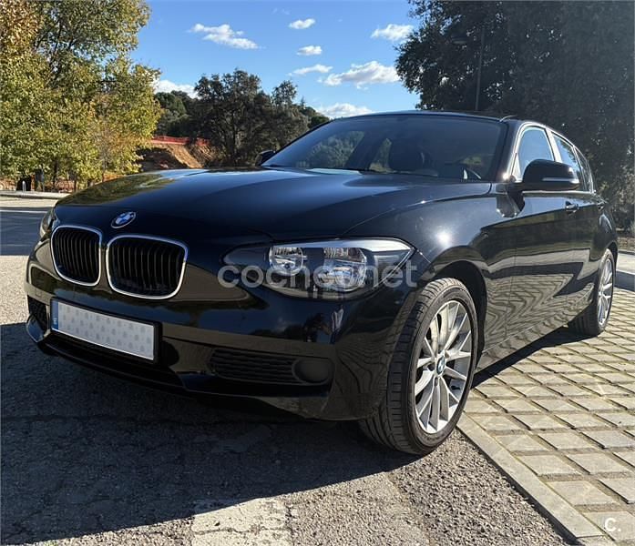 Negro Usado 2013 BMW 116 Comfort Edition Utilitario | 8299 € (Buen precio) - Imagen 1/4
