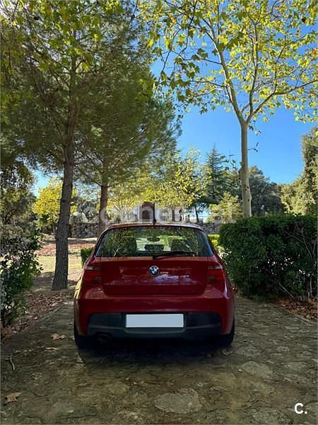 Używany BMW 118 143 KM (105 kW) 2009 Czerwony Hatchback