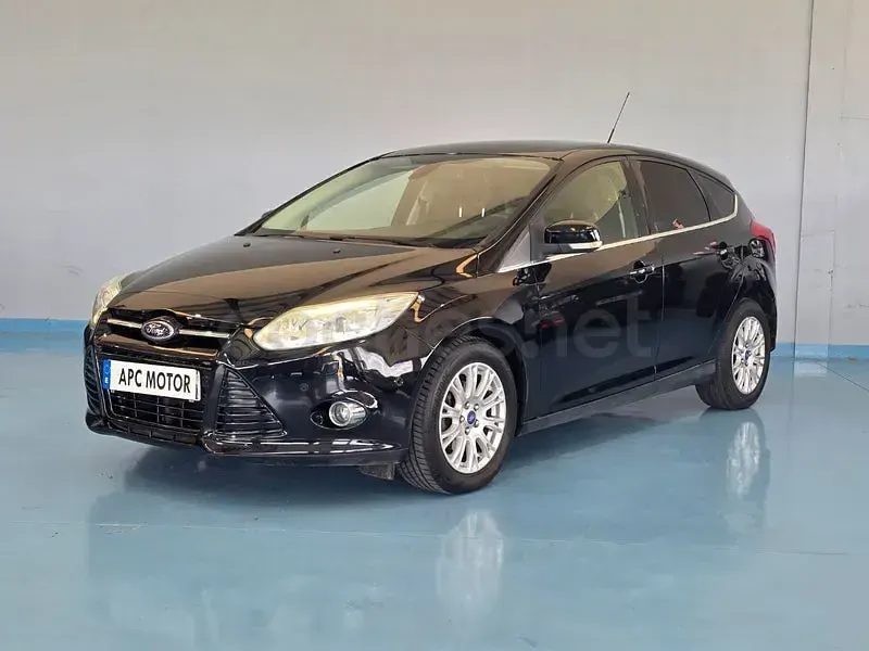 Usado Ford Focus Titanium 115 CV (84 kW) 2012 Negro Berlina
