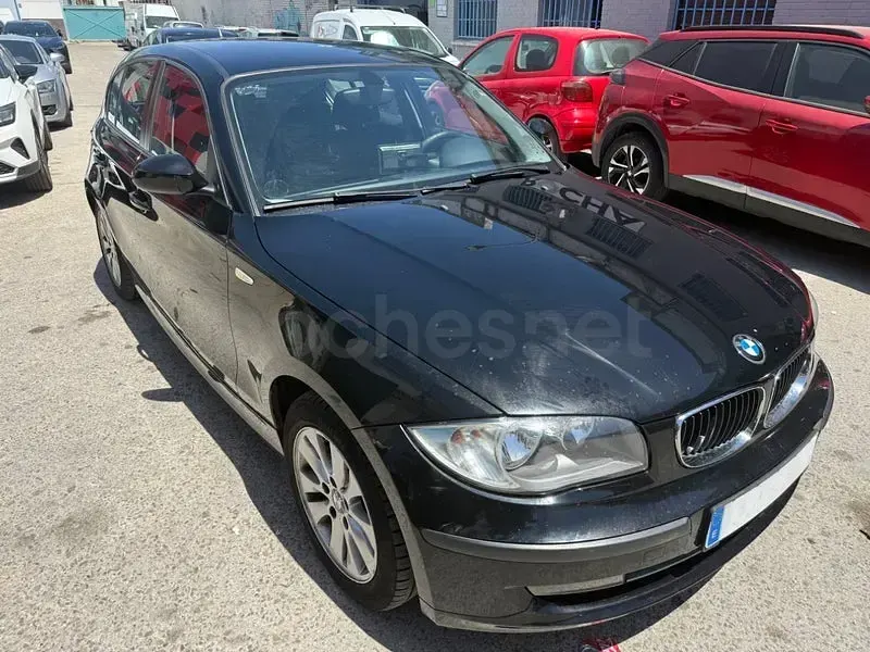 Usado BMW 116 122 CV (89 kW) 2009 Negro Utilitario