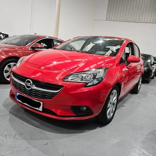 Usado Opel Corsa Selective 95 CV (69 kW) 2015 Rojo Utilitario