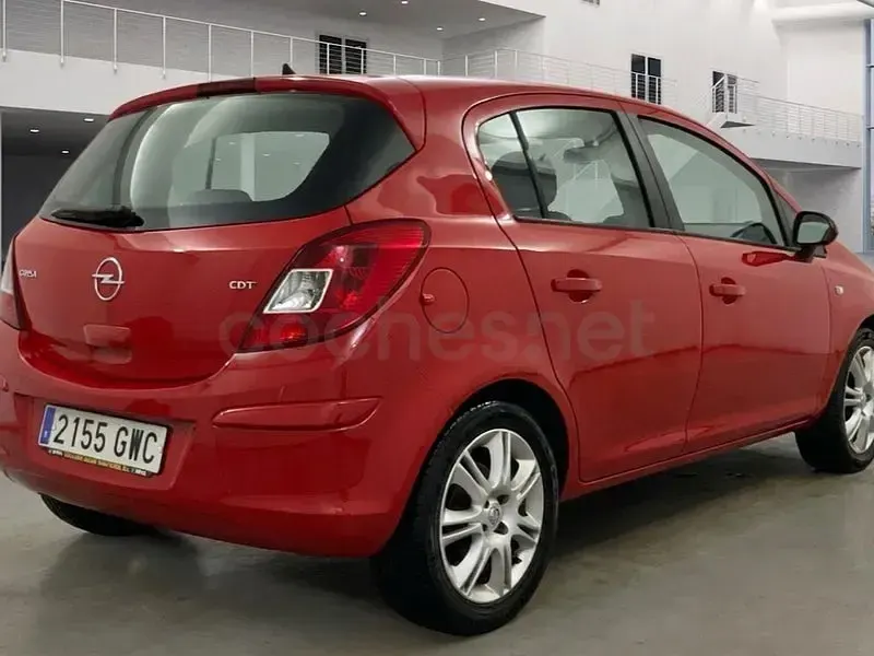 Usado Opel Corsa Cosmo 90 CV (66 kW) 2010 Rojo Utilitario