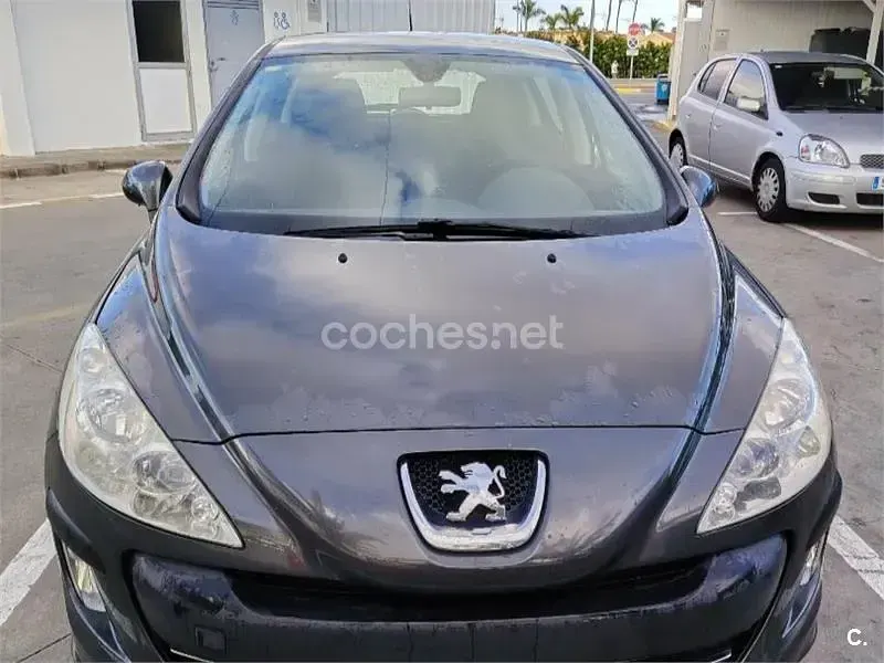 Usado Peugeot 308 98 CV (72 kW) 2010 Negro Berlina