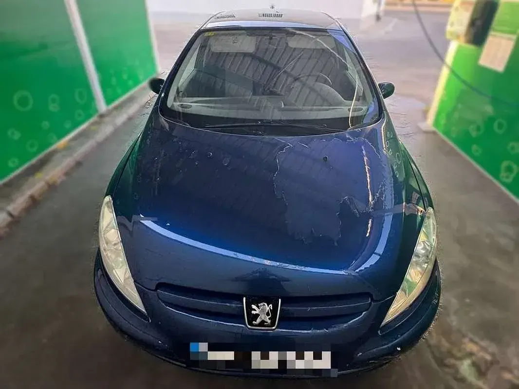 Usado Peugeot 307 90 CV (66 kW) 2003 Azul Berlina