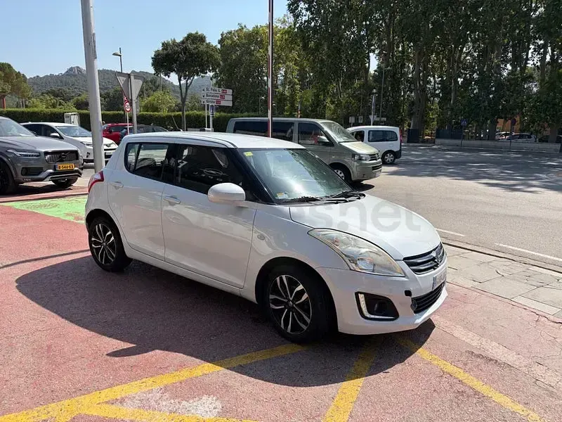Usado Suzuki Swift GLX 94 CV (69 kW) 2015 Gris / plata Utilitario
