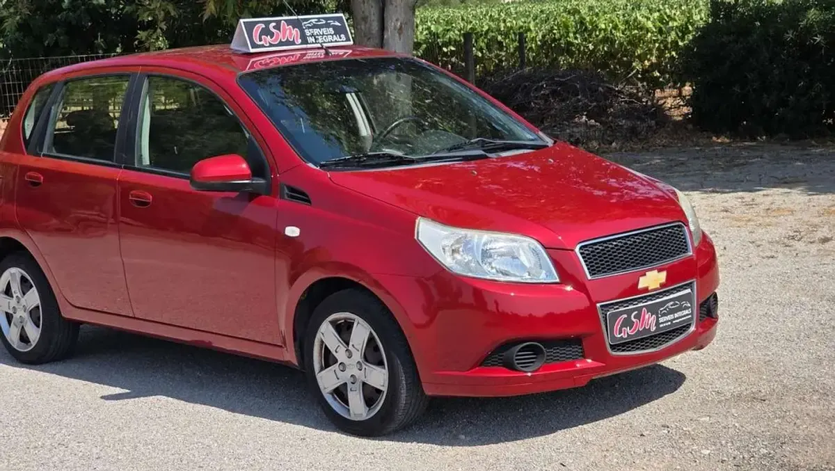 Usado Chevrolet Aveo LS 84 CV (61 kW) 2010 Burdeos Utilitario