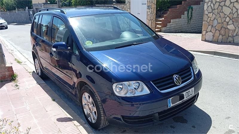 Usado VW Touran Conceptline 100 CV (73 kW) 2004 Azul Monovolumen