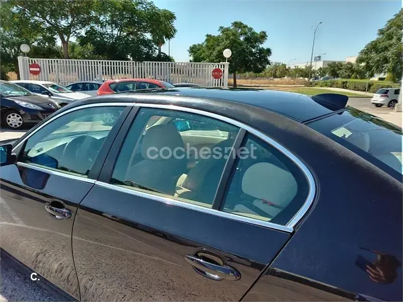 Usado BMW 520 163 CV (119 kW) 2006 Negro Berlina
