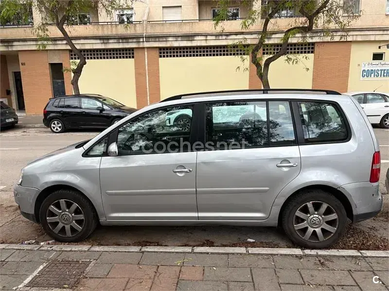 Używany VW Touran Advance 100 KM (73 kW) 2005 Szary Minivan