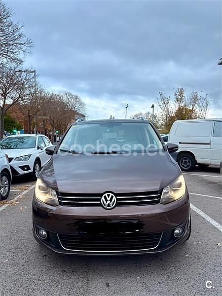 Usado VW Touran Advance 105 CV (77 kW) 2010 Granate Monovolumen