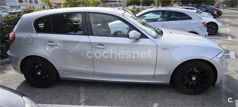 Usado BMW 118 122 CV (89 kW) 2007 Gris / plata Utilitario