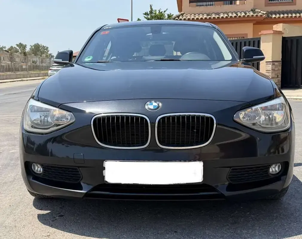 Usado BMW 116 116 CV (85 kW) 2013 Negro Utilitario