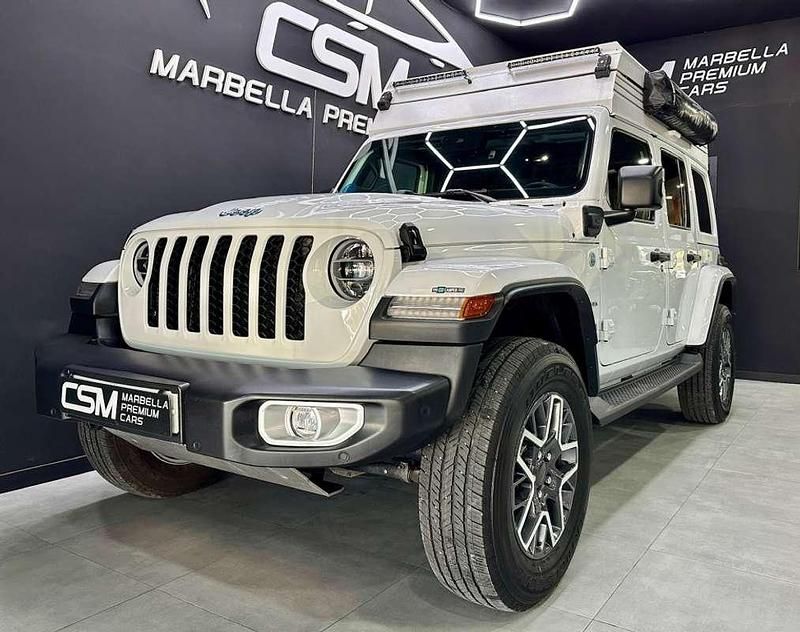 Blanco Usado 2022 Jeep Wrangler Unlimited Sahara SUV | 76.990 € - Imagen 1/4