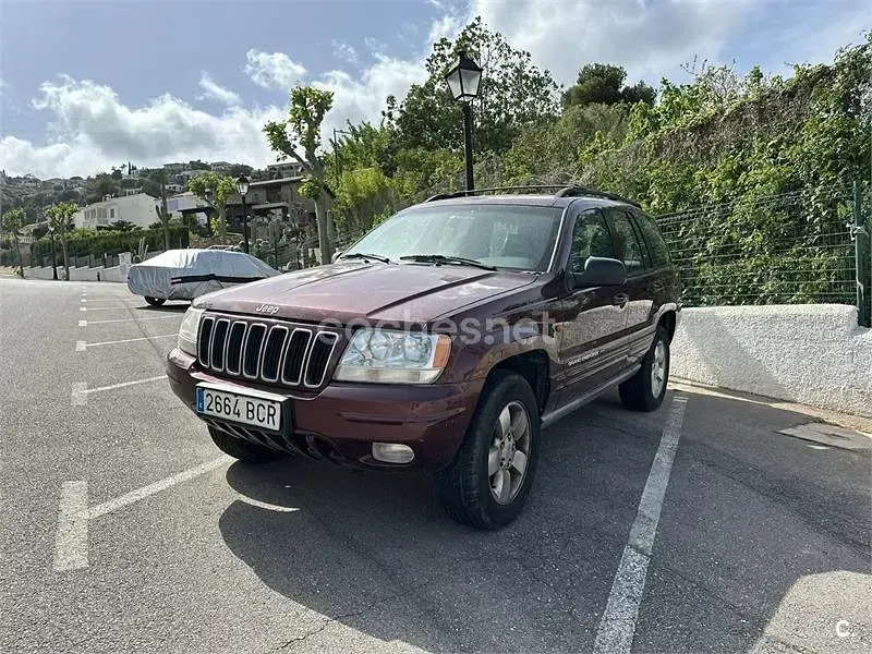 Usado Jeep Grand Cherokee Laredo 140 CV (102 kW) 2000 Granate SUV