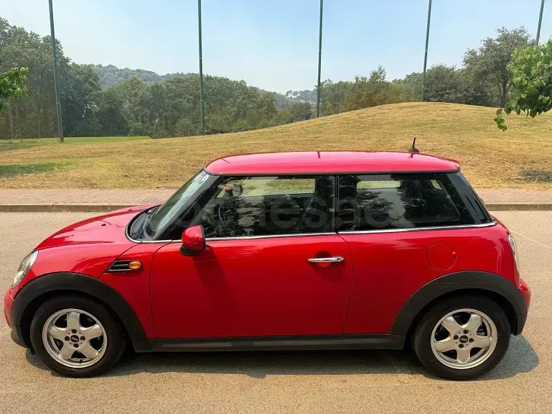 Usado Mini Cooper 122 CV (89 kW) 2010 Rojo Utilitario