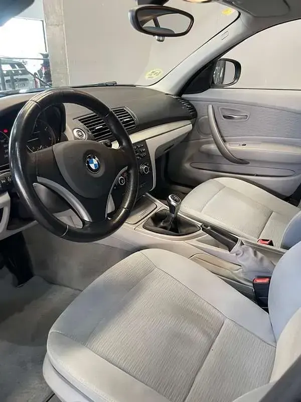 Usado BMW 116 116 CV (85 kW) 2009 Negro Utilitario