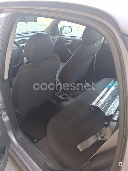 Usado Opel Corsa Club 75 CV (55 kW) 2004 Gris / plata Utilitario