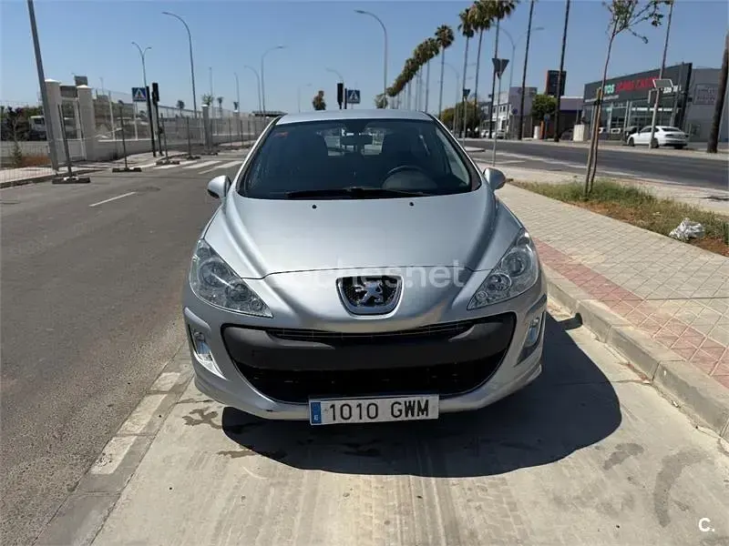 Usado Peugeot 308 98 CV (72 kW) 2010 Gris / plata Berlina