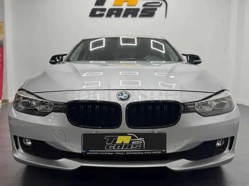 Usado BMW 318 143 CV (105 kW) 2013 Gris / plata Familiar