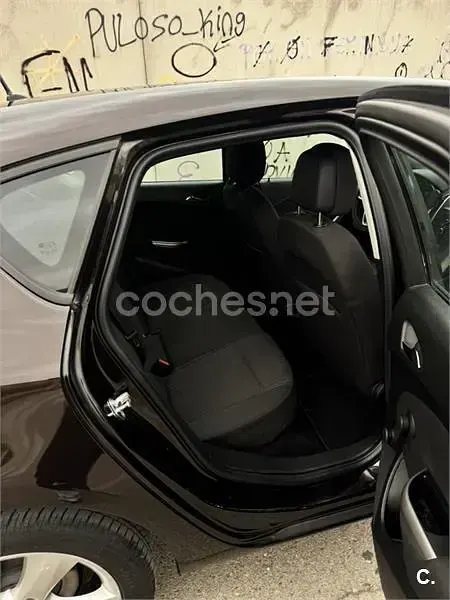 Usado Opel Astra Enjoy 100 CV (73 kW) 2012 Marrón Berlina