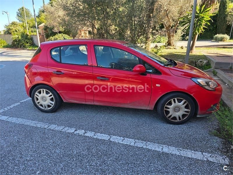Usado Opel Corsa Expression 75 HP (55 kW) 2015 Vermelho Citadino