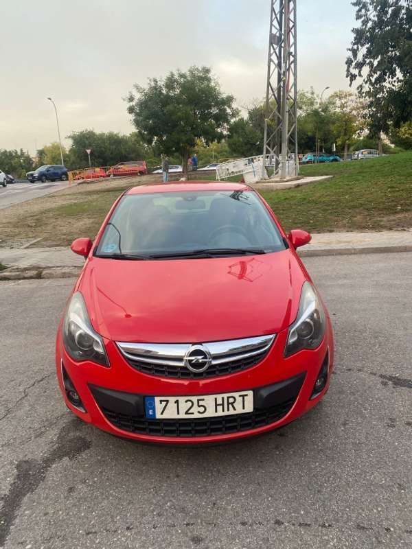 Usado Opel Corsa Selective 86 CV (63 kW) 2014 Rojo Utilitario