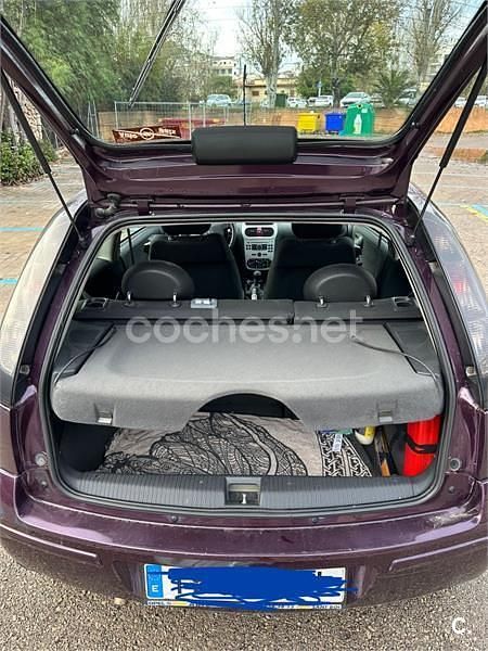 Usado Opel Corsa 80 CV (58 kW) 2005 Granate Berlina