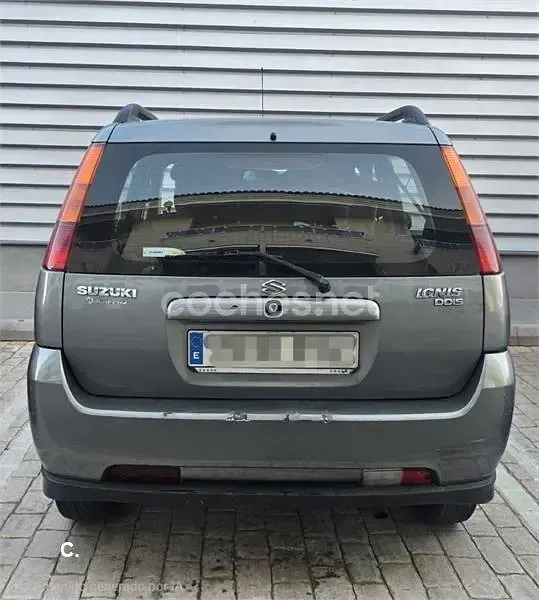 Usado Suzuki Ignis 69 CV (50 kW) 2006 Gris / plata Utilitario