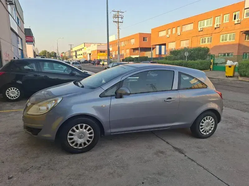 Usado Opel Corsa 85 HP (62 kW) 2010 Cinzento Citadino