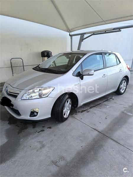 Gris / plata Usado 2012 Toyota Auris Hybrid Active Berlina | 8790 € (Precio justo) - Imagen 1/4