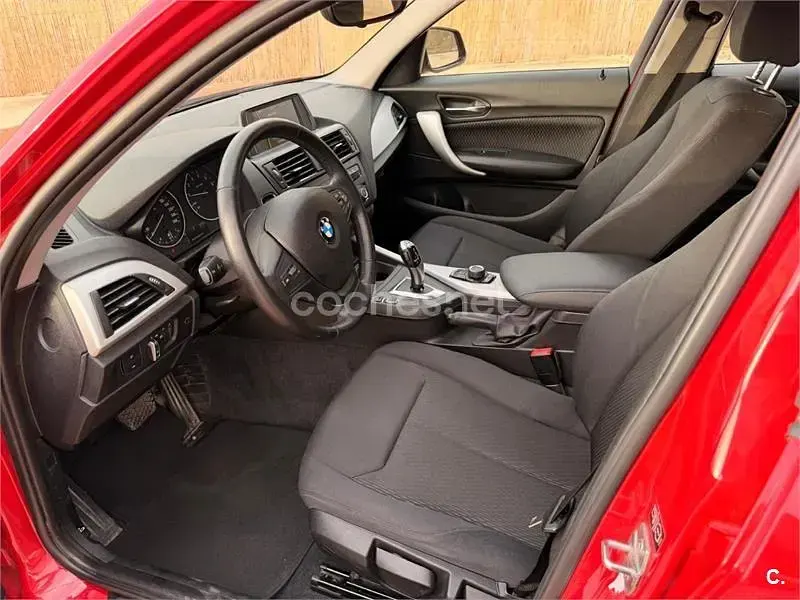 Usado BMW 116 122 CV (89 kW) 2012 Rojo Utilitario