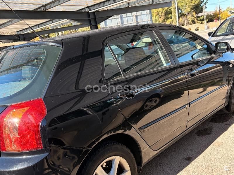 Usado Toyota Corolla Sol 116 CV (85 kW) 2005 Negro Berlina