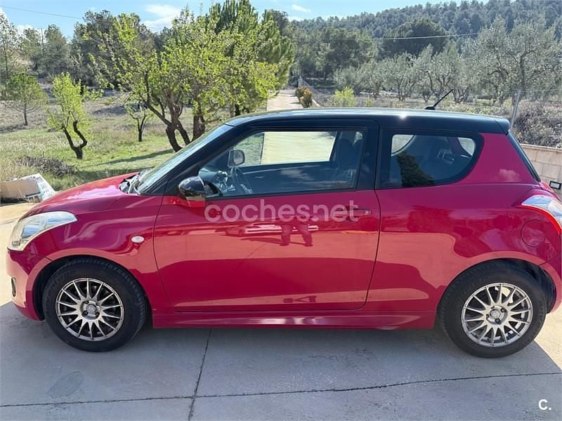 Rojo Usado 2013 Suzuki Swift GLX Berlina | 5500 € (Buen precio) - Imagen 1/4