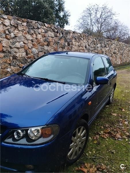 Usado Nissan Almera Tekna 112 CV (82 kW) 2003 Violeta / lila Berlina