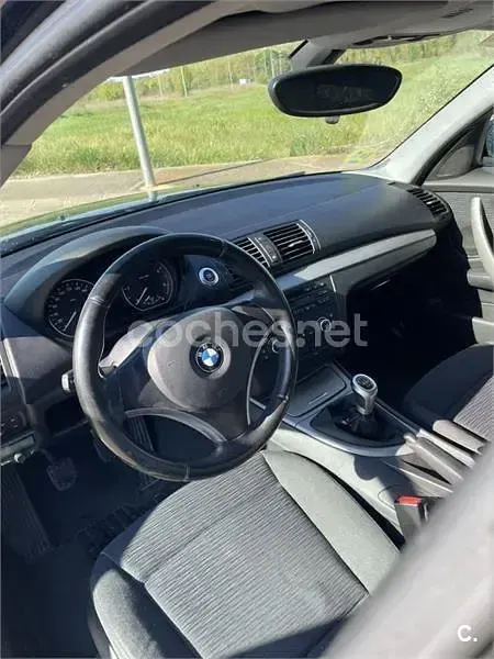 Usado BMW 118 122 CV (89 kW) 2007 Negro Utilitario
