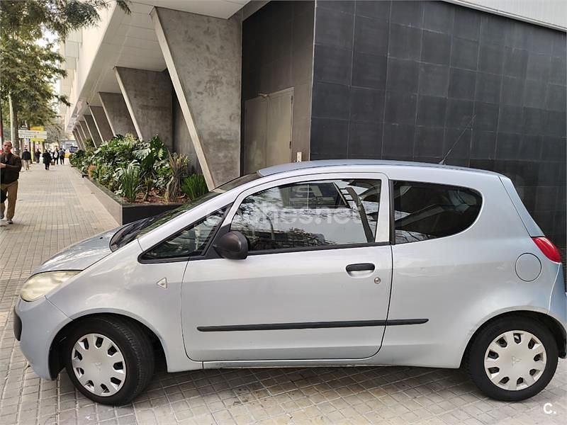 Usado Mitsubishi Colt Invite 75 CV (55 kW) 2006 Azul Berlina