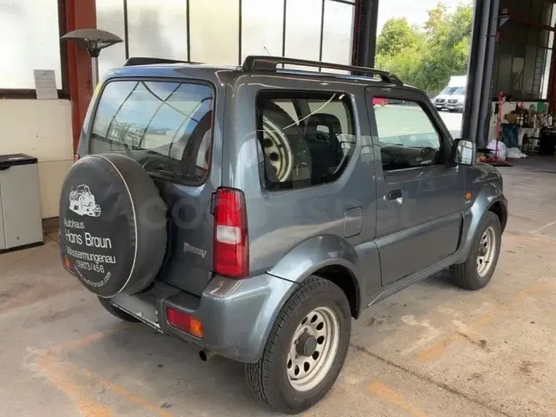 Usado Suzuki Jimny 86 CV (63 kW) 2006 Gris / plata SUV