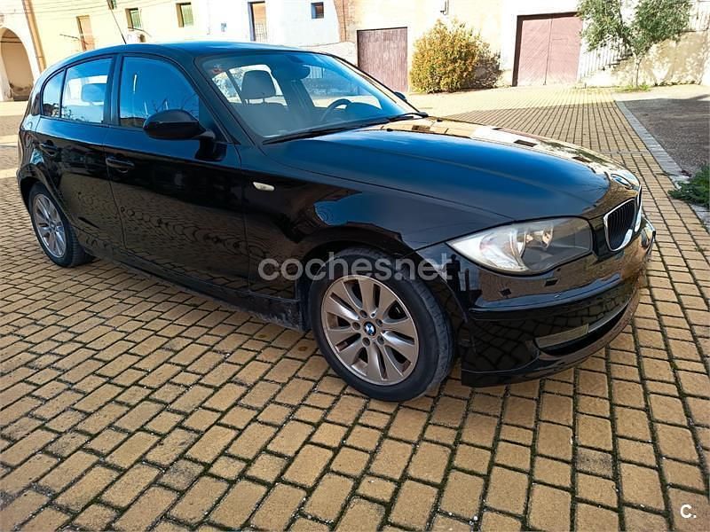 Usado BMW 118 122 CV (89 kW) 2007 Negro Utilitario