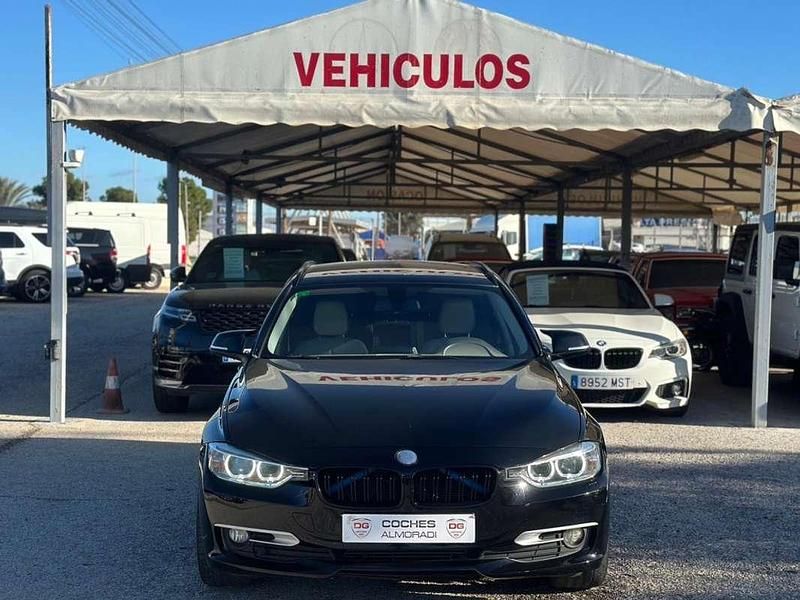 Negro Usado 2013 BMW 320 Comfort Edition Familiar | 9490 € (Precio justo) - Imagen 1/4