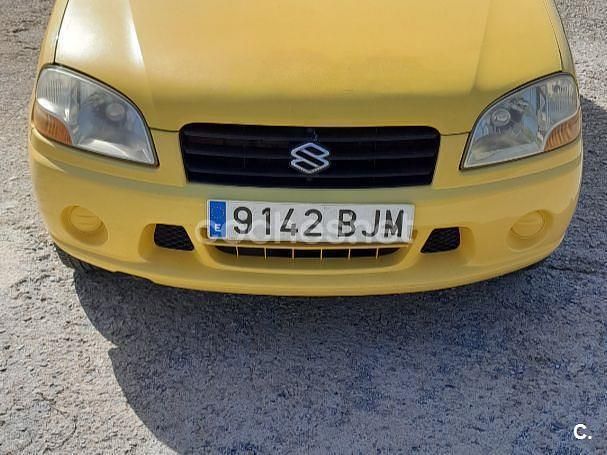Usado Suzuki Ignis GL 83 CV (61 kW) 2001 Amarillo Utilitario