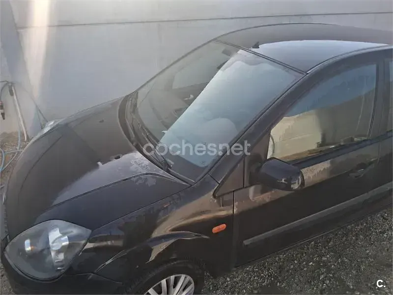 Usado Ford Fiesta Ghia 80 CV (58 kW) 2007 Negro Utilitario