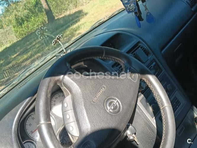 Usado Opel Astra Enjoy 80 HP (58 kW) 2004 Cinzento Sedan