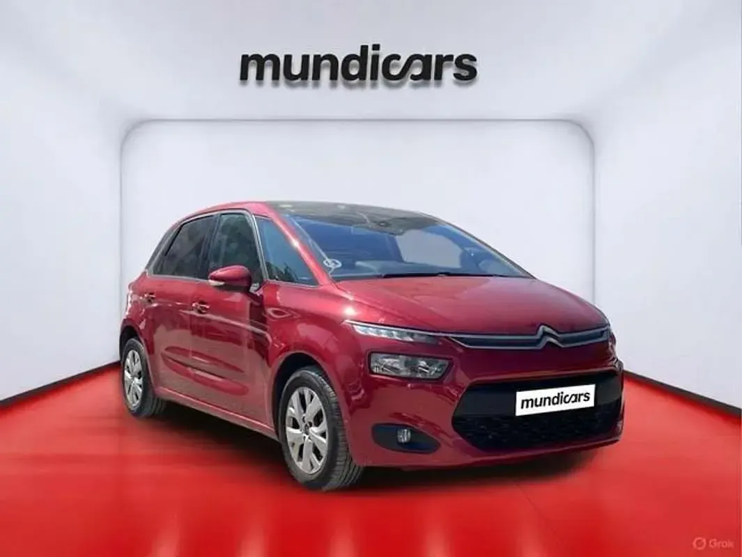 Usado Citroën C4 Seduction 114 CV (83 kW) 2014 Rojo Utilitario