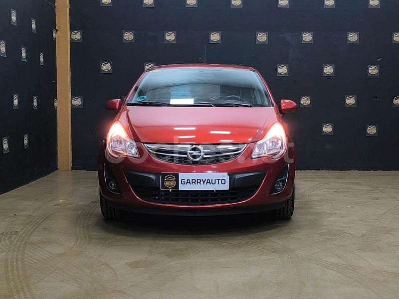 Usado Opel Corsa Selective 85 CV (62 kW) 2013 Naranja Berlina