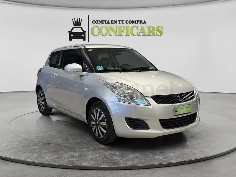 Usado Suzuki Swift 95 CV (69 kW) 2013 Gris / plata Utilitario