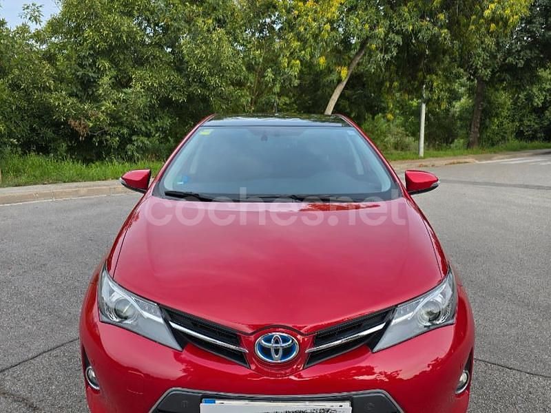 Usado Toyota Auris Hybrid Advance 136 CV (100 kW) 2014 Granate Berlina
