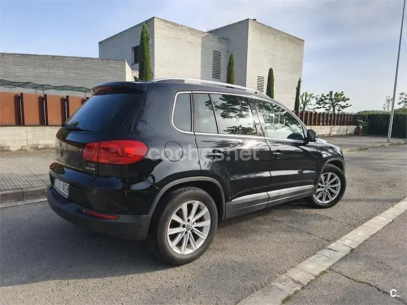 Käytetty VW Tiguan Sport 160 HP (117 kW) 2014 Musta Katumaasturi